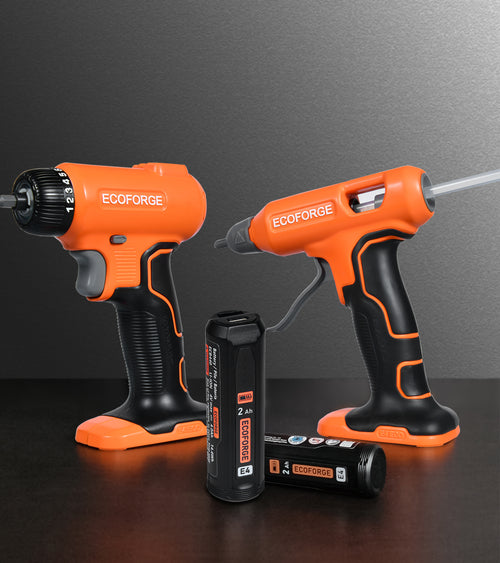 Two orange and black Ecoforge cordless power tools on a dark surface against a gray background, with two black batteries in front.
